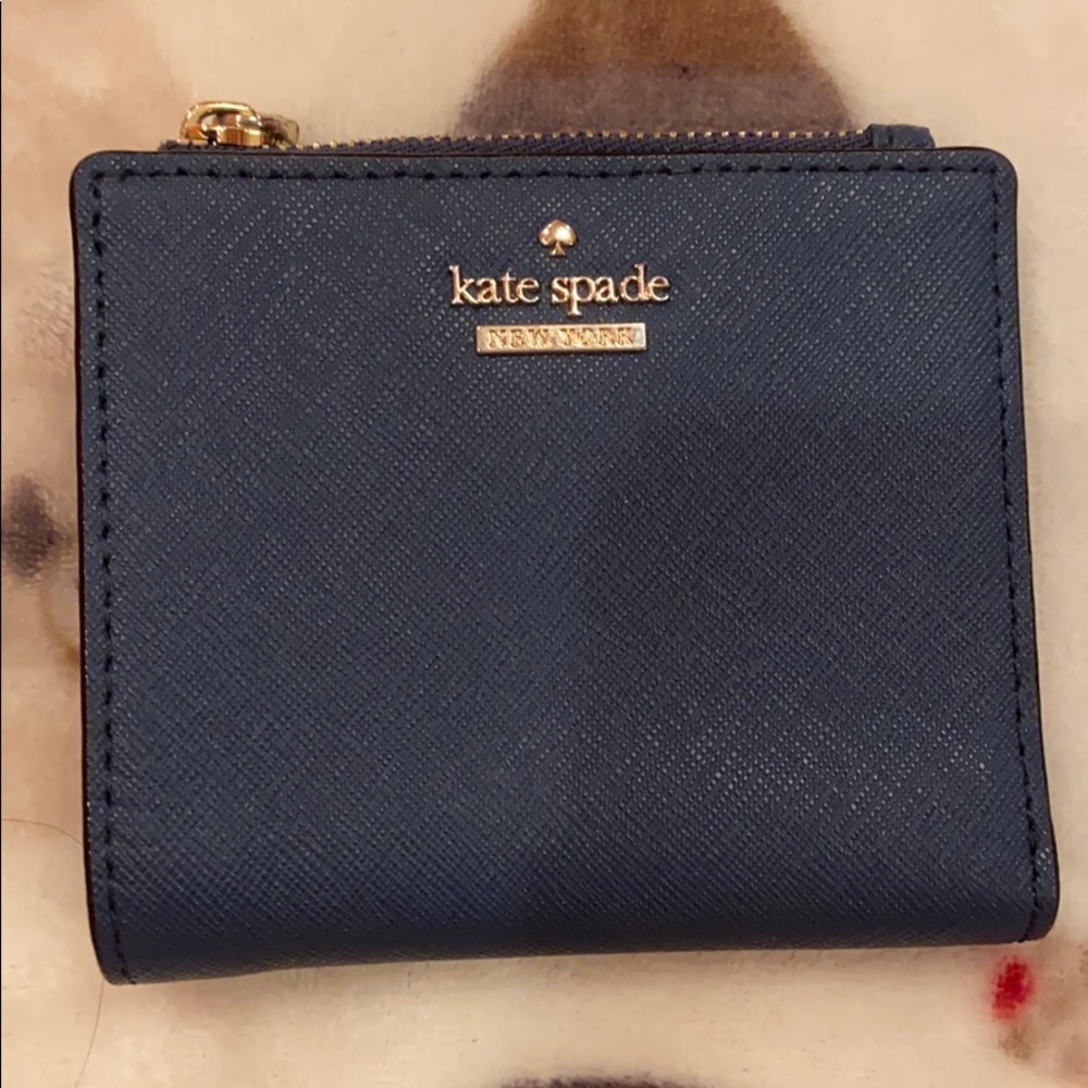 Kate Spade bi-fold wallet with snap closure